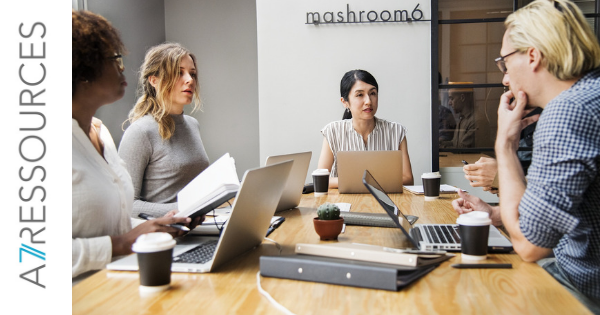 Groupe de collaborateurs en réunion